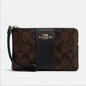 Coach Corner Zip Wristlet In Signature Canvas